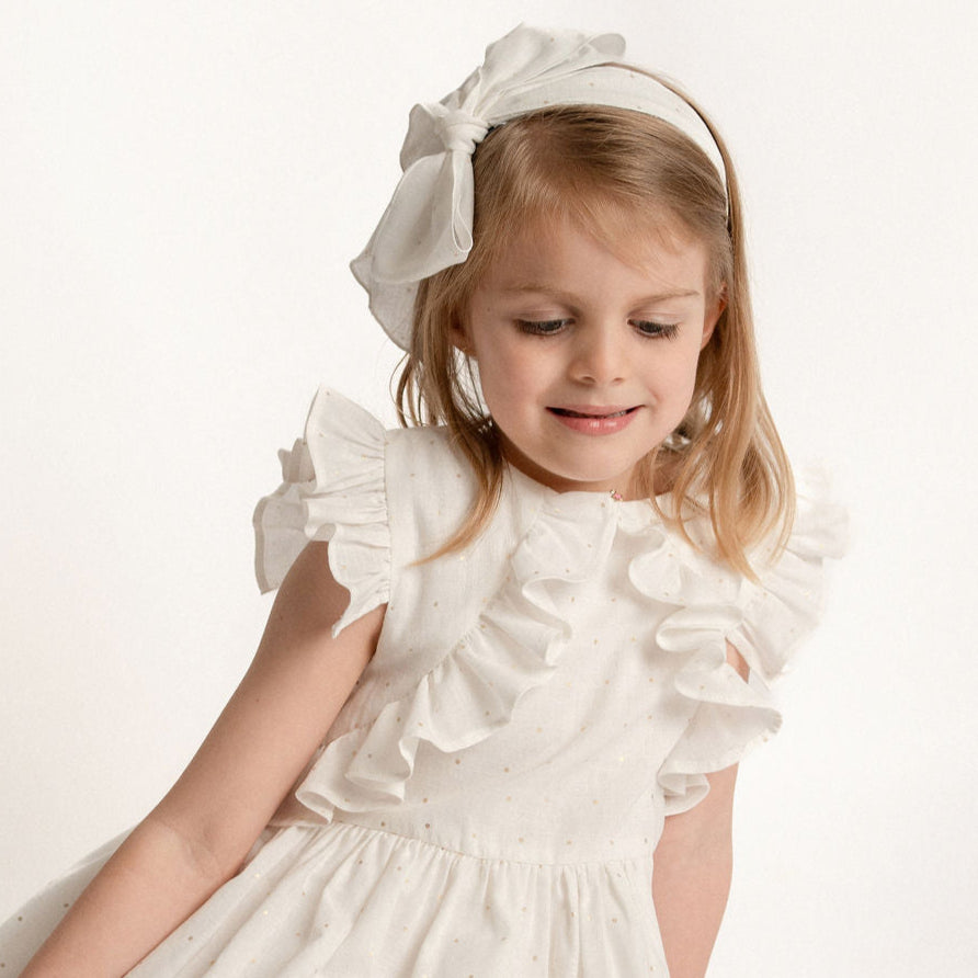 VESTIDO BLANCO PUNTOS DORADOS