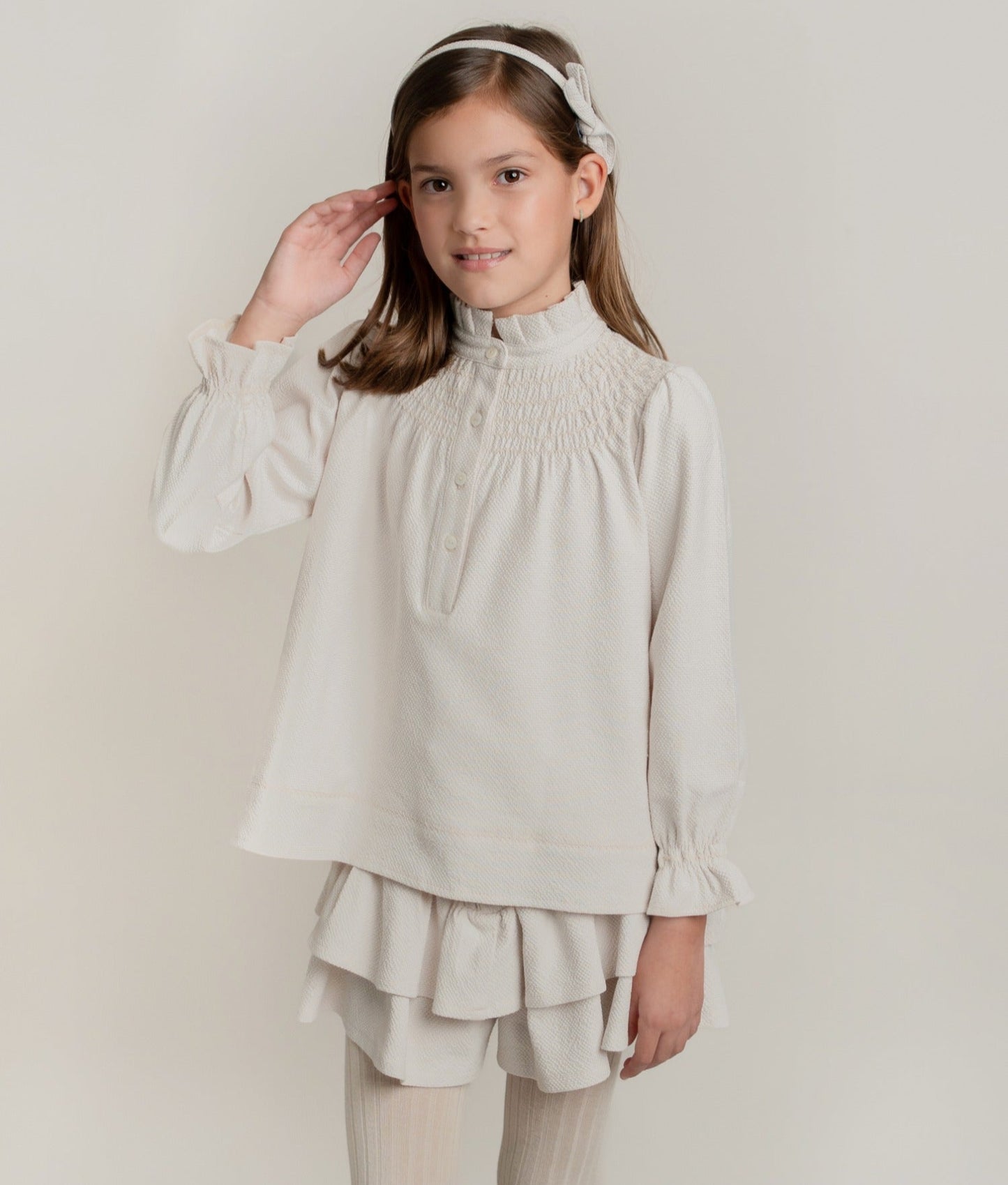 CONJUNTO BLUSA Y FALDA SHORT ARENA