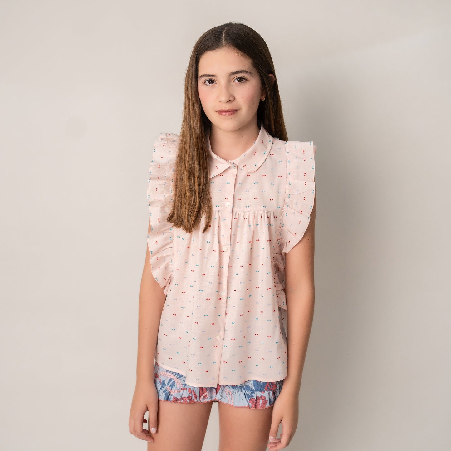 CONJUNTO BLUSA ROSA SHORT FLORES